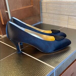 Salvatore Ferragamo Black Flats Luxurious satin pumps